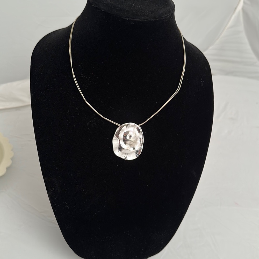 Silver tone necklace